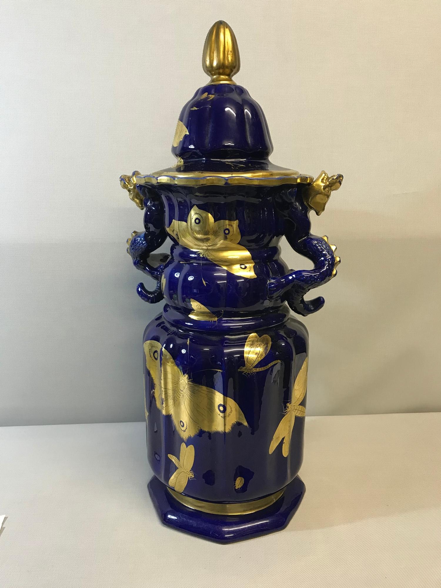 Large Masons Ironstone Mazarine Blue 2 handled temple jar with lid. Styled with gilt butterflies and