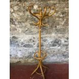 Bent wood coat stand. measures 160cm in height.