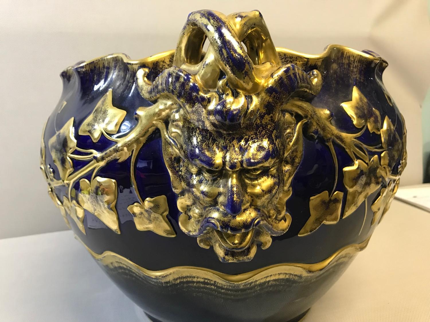 Large Sarreguemines pottery two handled plant pot. Styled with gilt foliage and two ram style heads. - Image 2 of 4