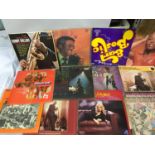 A Lot of LP records which includes artist such as Louis Armstrong, Stevie Wonder, Frank Sinatra &