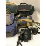 A lot of two cameras to include Nikon F60 camera & Ricoh, together with various camera bags