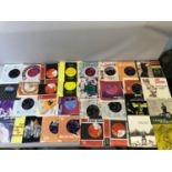 A Large collection of 45RPM's records. Which includes artists such as ABBA, The Who, The Beatles,