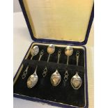 A Set of 6 ornate Birmingham silver tea spoons. Makers W J Myatt & Co dated 1936. Has a fitted box