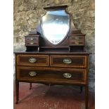 Edwardian dressing table chest of drawers with shield shaped mirror backing. Measures 158x107x55.5cm