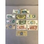 A Collection of 12 Royal bank of Scotland & Bank of England bank notes which includes dates from