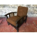 1920's fire side arm chair with bergere sides.