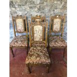 A Lot of 4 Victorian Solid oak dining chairs with castor feet.