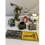 A Collection of odds which include an Mary Gregory hand painted decanter, Brass discus figure,