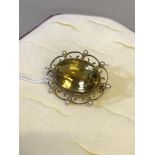 9ct gold ladies dress brooch set with a large yellow stone (possibly citrine) fitted also with