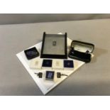 A Collection of Rolls Royce badges, cuff links and presentation box