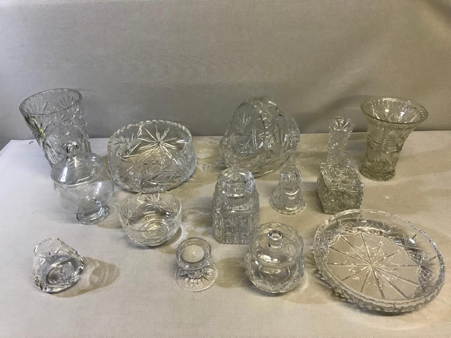 A mixed lot of crystal, to include bowls, vases & preserves