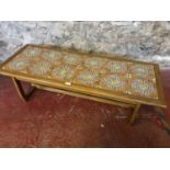 Retro tile topped coffee table. Measures 39x139x49.5cm