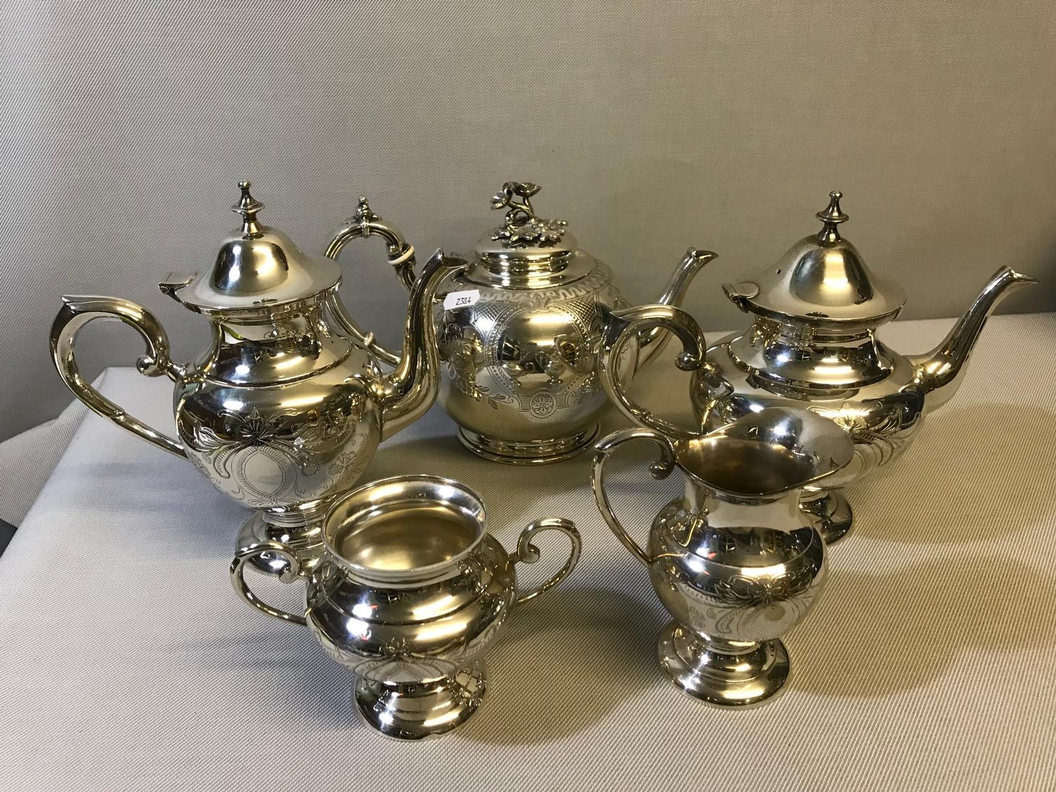 Ornate EP tea pot together with 4 piece Ep tea/ coffee service