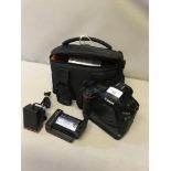 Canon EOS-1 camera, together with accessories and carry bag