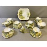 A 22 piece fine bone China Shelley tea set, design 'Daffodil Time', 13370