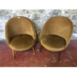 2 Retro wood and material tub chairs.