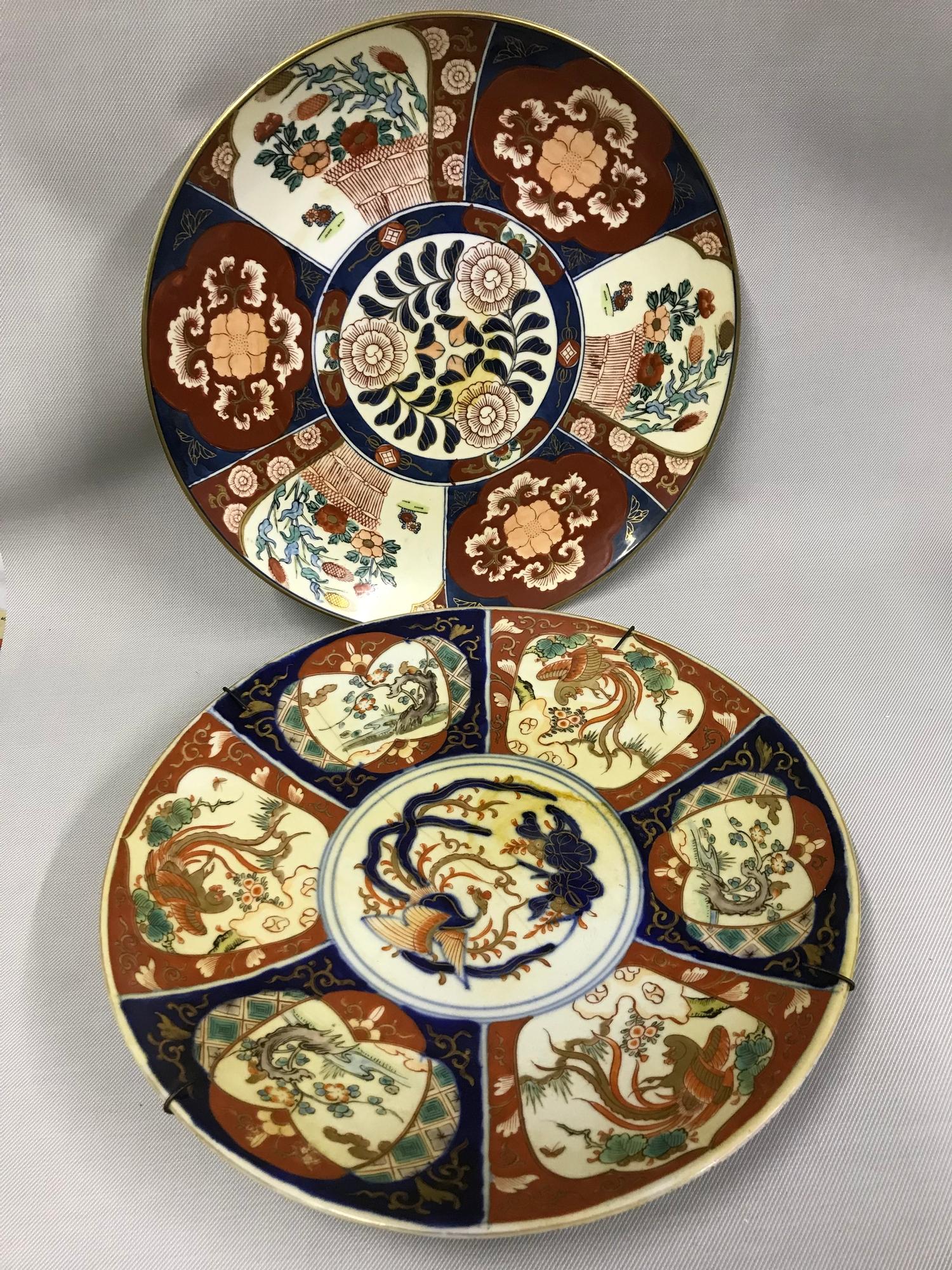2 Early 20th century Imari pattern hand painted chargers. One Stamped to the back with 4 stamp