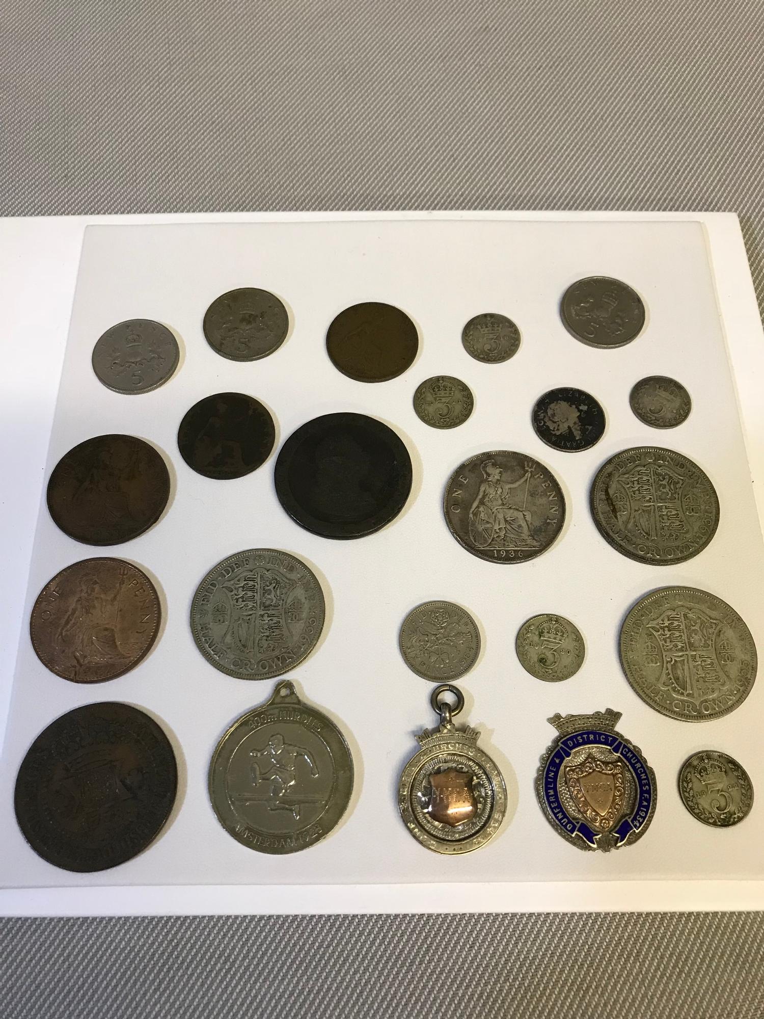 A Collection of Silver pre decimal coins. Which includes 1778 Brazil coin, 1936 silver one penny,