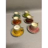 Set of six tea cups and saucers by Old Foley, styled in an harlequin design.