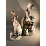 A Nao figurine depicting a lady collecting water together with another figurine .Cecilia The