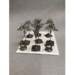 A Lot of silver plated jewellery stands together with 2 cherub and foliage design menu/ card holders