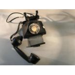 A vintage telephone in black