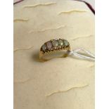 18ct Gold ladies ornate ring styled with 5 opal stones. Ring size P. Weighs 3.16grams