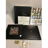 The Millennium stamp collection album together with Royal Mail Millennium stamps. Together with