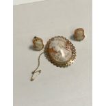 9ct gold cameo brooch with matching earrings.