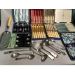 A Lot of Boxed cutlery sets which includes Walker & hall knife set, Thistle design spoon and tong