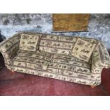 Large scroll back and sides tapestry fabric sofa. In very good condition. Measures 82x235x104cm.