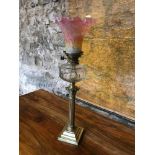 Victorian brass Corinthian column paraffin desk lamp, 73cm in height