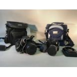 A lot of two camera's; FujiFilm finepix 'HS50' & 'S5000', together with carry bags