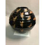 A Large 20th century oriental bee hive shaped vase depicting butterflies. Measures 29cm in height,