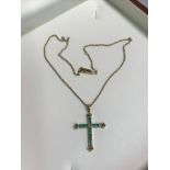 9ct Gold chain with 9ct gold & emerald set cross pendant. weighs 5.58 grams