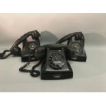 A lot of three vintage dial phones, in black