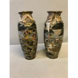 A Pair of Antique early 19th century large Satsuma Meiji hand painted samurai vases with raised