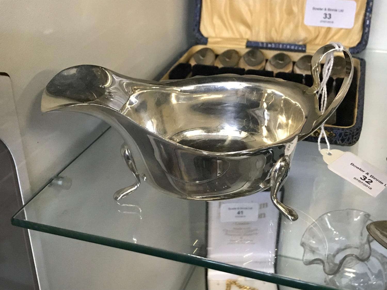 Sheffield silver 3 foot cream jug. Makers Viners Ltd, dated 1933.