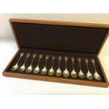 A Collection of 12 London silver tea spoons for the RSPB. Comes with a fitted box. Approximate