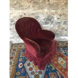 Vintage red velvet material bedroom chair done with button back and in a tub style