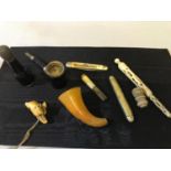 A collection of odds to include a carved dog whistle, an Edinburgh Scottish exhibition 1908 multi