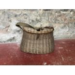 Antique wicker fishing creel.