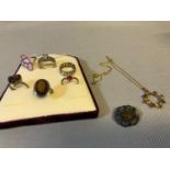 A Collection of silver jewellery which includes 6 rings, agate brooch and silver gilt chain with