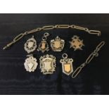 A collection of seven silver fob medals & silver hall marked Albert chain