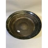 Antique Asian Bronze wash bowl. Measures 31.5cm in diameter