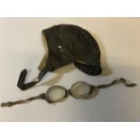 A World War One RAF Pilots cap, together with goggles (no markings)