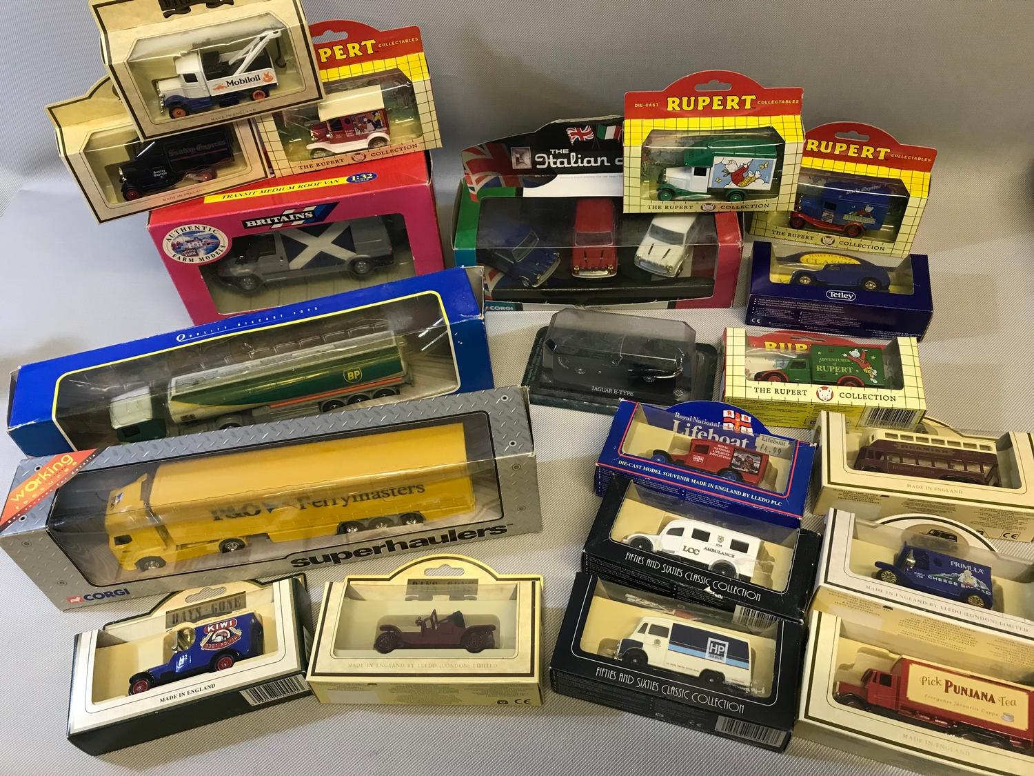 A Lot of various boxed lorry and van models includes corgi, Britains and Rupert the bear