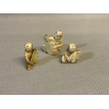 Three 19th century carved netsuke figures