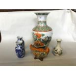 A mixed lot of oriental vases, together with an oriental lidded pot