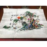 Large Oriental silk tapestry Depicting peacock & various other birds.